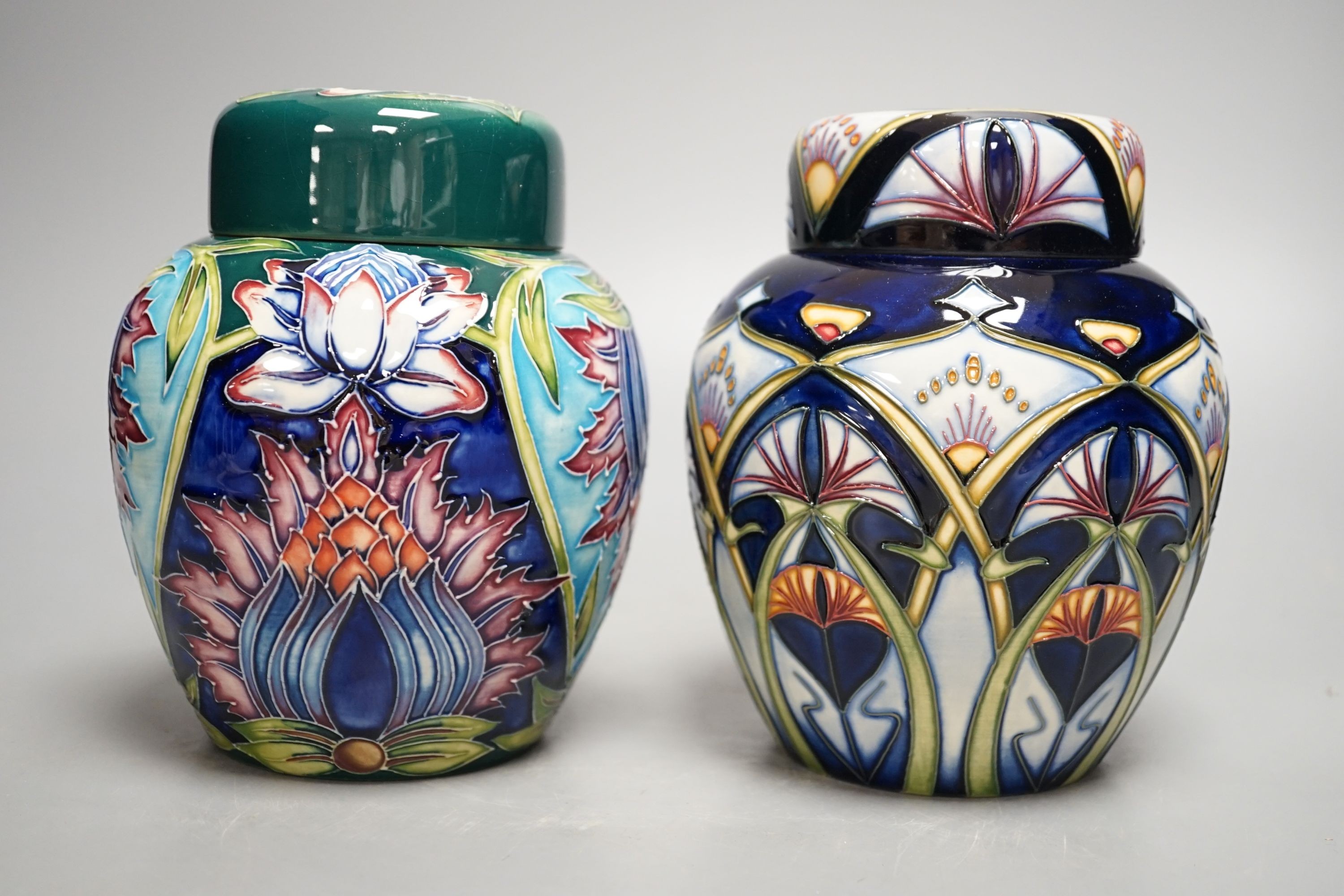 Two Moorcroft trial ginger jars and covers, signed Rachel Bishop and Shirley Hayes, 2001 and 2002, 16cm., with boxes
